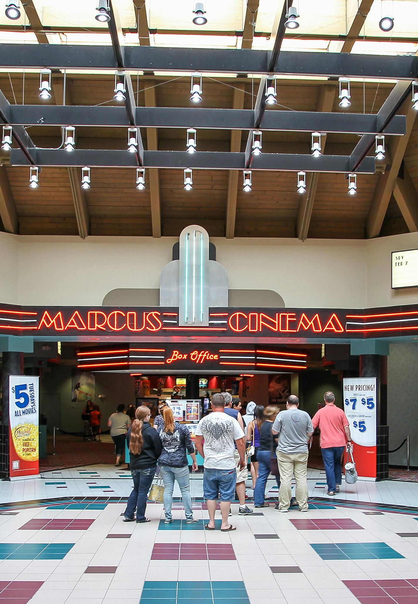 Moviegoers line up for tickets on a Tuesday night at Marcus Theatres in Shakopee, currently the city&#x2019;s only theater complex. Marcus Theatres is building a new 10-screen complex about 7 miles to the east.