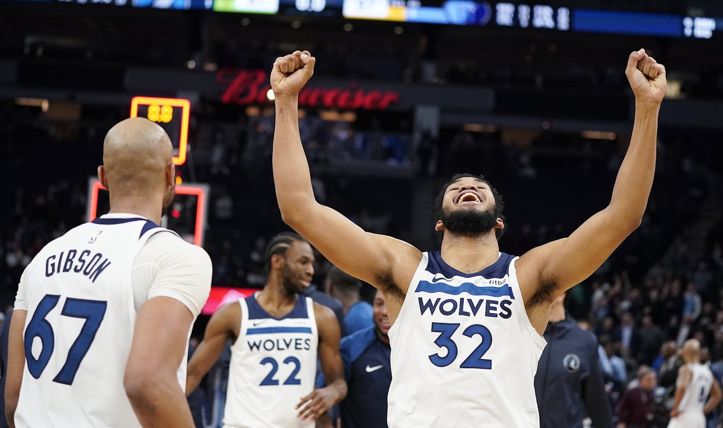 Minnesota Timberwolves center Karl-Anthony Towns (32), who scored the winning basket, celebrates their 99-97 overtime win over the Memphis Grizzlies. ] LEILA NAVIDI &#xa5; leila.navidi@startribune.com BACKGROUND INFORMATION: The Minnesota Timberwolves play against the Memphis Grizzlies at Target Center in downtown Minneapolis on Wednesday, January 30, 2019. The Minnesota Timberwolves won the game in overtime 99-97.