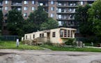 An abandoned manufactured home slated for demolition at Lowry Grove mobile home park Thursday, June 29, 2017, in St. Anthony, MN. Lowry Grove closed i
