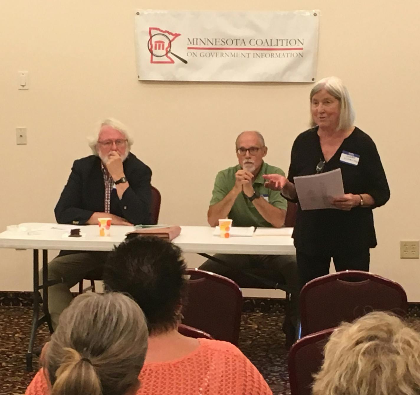 Sharon Schmickle introduces two other members of the Minnesota Coalition on Government Information to an audience in Stillwater who came to learn about access to public data. Behind her is speaker Don Gemberling, left, and another coalition member, Steve Brandt. Schmickle and Brandt are retired Star Tribune reporters.