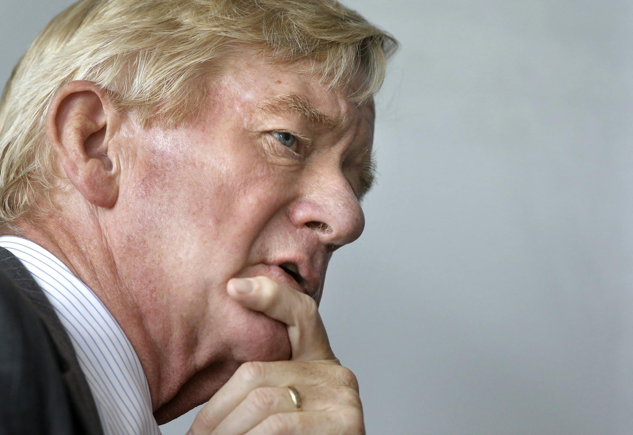 FILE - In this Sept. 8, 2016, file photo, former Massachusetts Republican Gov. William Weld takes questions from members of the media on the campus of Emerson College in Boston. Weld, who ran for vice president as a Libertarian in 2016, confirmed Tuesday, Feb. 5, 2019, he has changed his party registration back to Republican as he mulls a possible primary challenge against President Donald Trump. (AP Photo/Steven Senne, File)