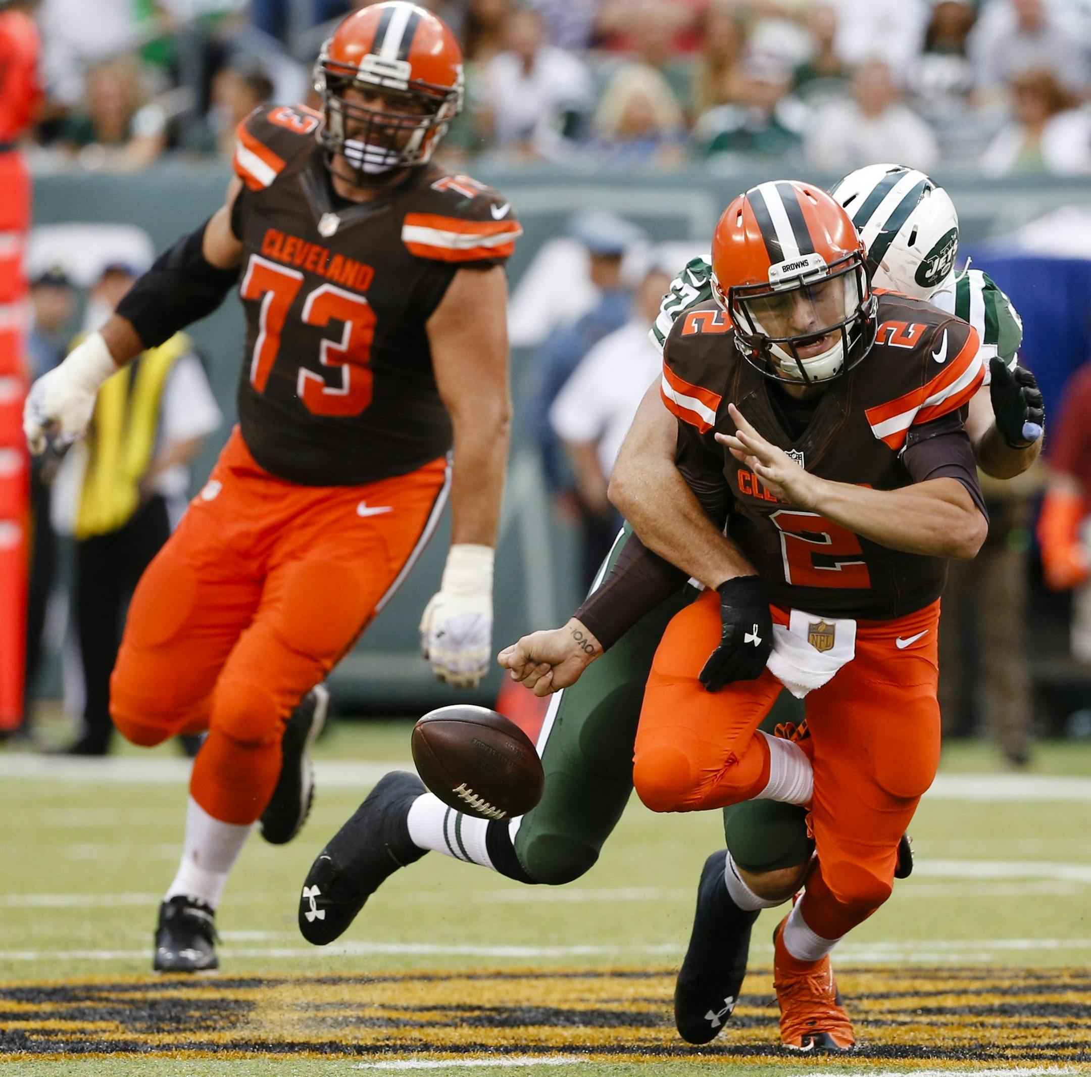 Cleveland Browns quarterback Johnny Manziel (2) reacts as he fumbles the ball while being sacked by New York Jets outside linebacker Trevor Reilly (57) during the second half of an NFL football game Sunday, Sept. 13, 2015 in East Rutherford, N.J. The Jets won 31-10. (AP Photo/Jason DeCrow)
