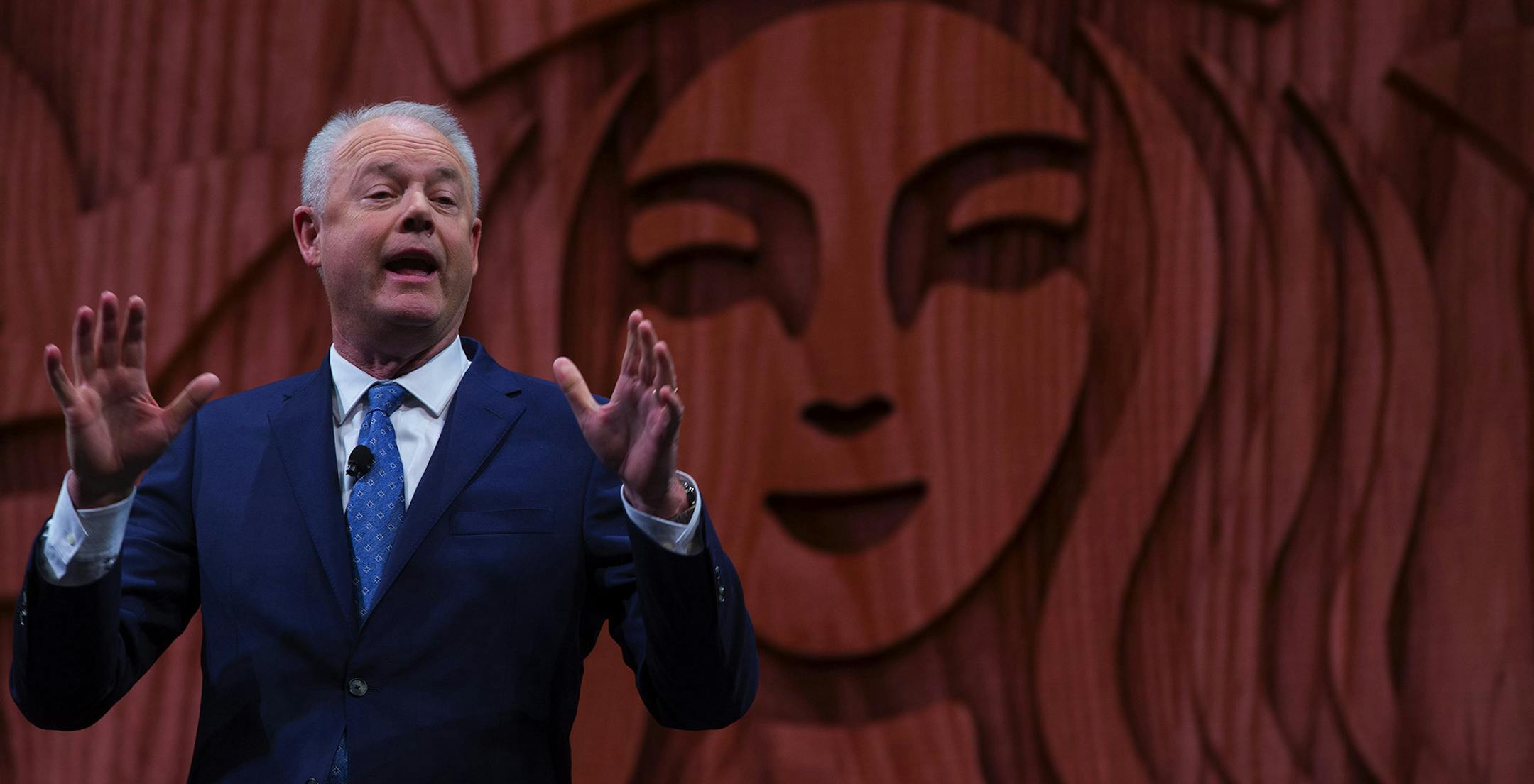 Starbucks President and CEO Kevin Johnson speaks at the 26th Annual Meeting of Shareholders at McCaw Hall in Seattle, with more than 3,000 shareholders, employees, guests and board members, on Wednesday, March 21, 2018. (Ellen M. Banner/The Seattle Times/TNS) ORG XMIT: 1797452