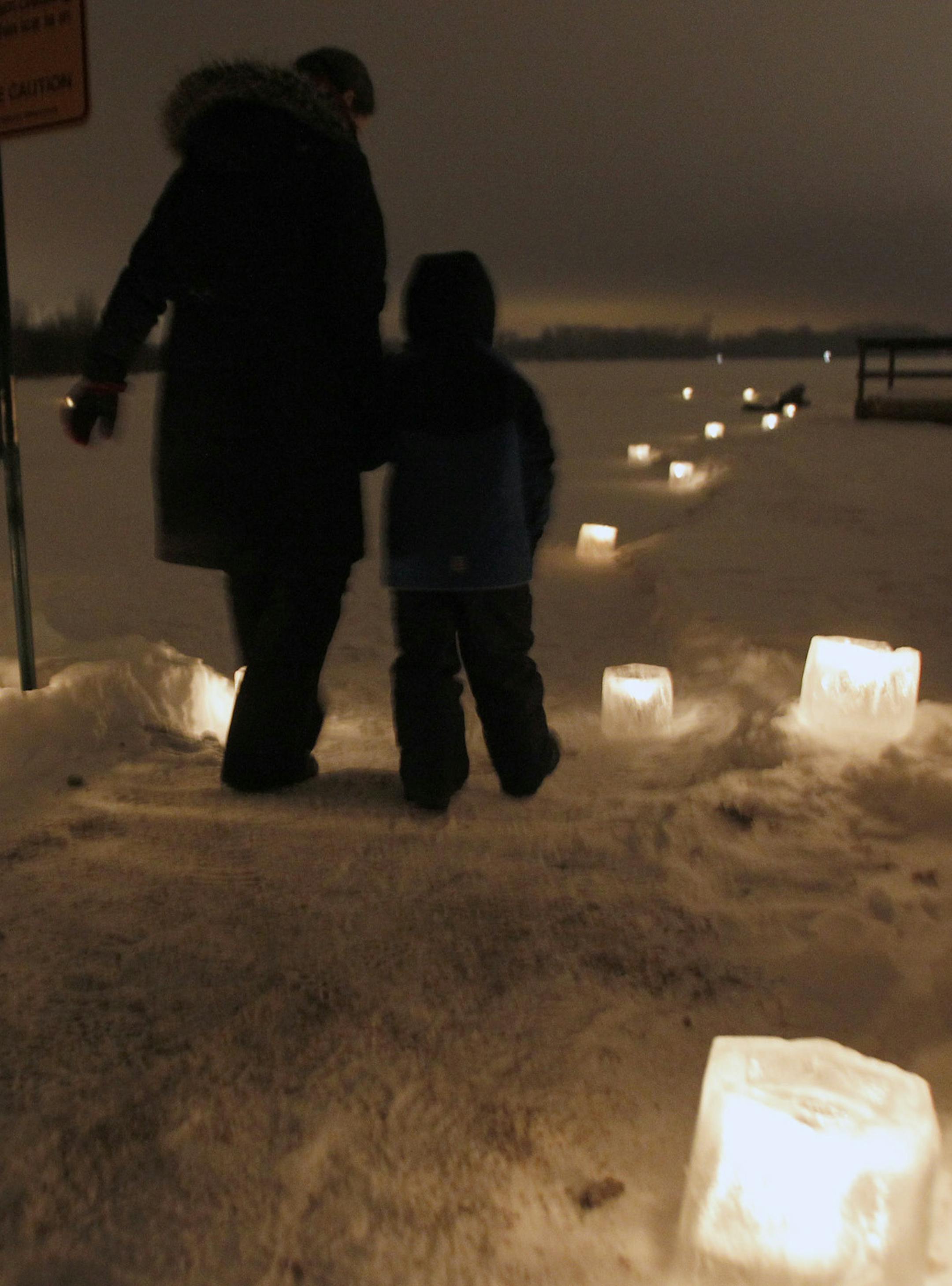 New Year's Eve celebration at Fort Snelling State Park with skating by a wood fire, hot chocolate and cider and a walk through candlelit paths.