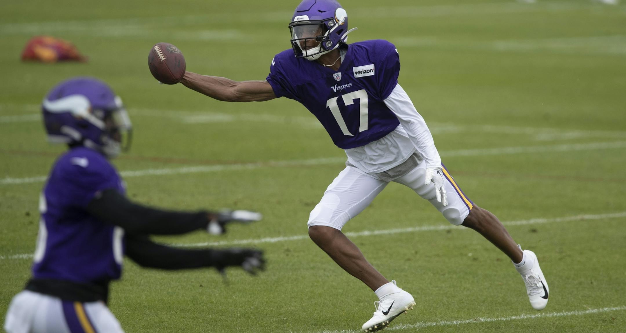 Minnesota Vikings wide receiver Dillon Mitchell (17) reached for a pass during practice at TCO Performance Center on Sunday July, 28 2019 in Eagan, MN.