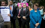 Democratic senators attend at a rally opposing renewed Republican efforts to repeal the Affordable Care Act, on Capitol Hill in Washington, Sept. 19, 