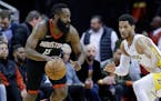 Houston Rockets guard James Harden (13) looks for a way around Los Angeles Lakers guard Josh Hart (5) in the first half of an NBA basketball game Sund