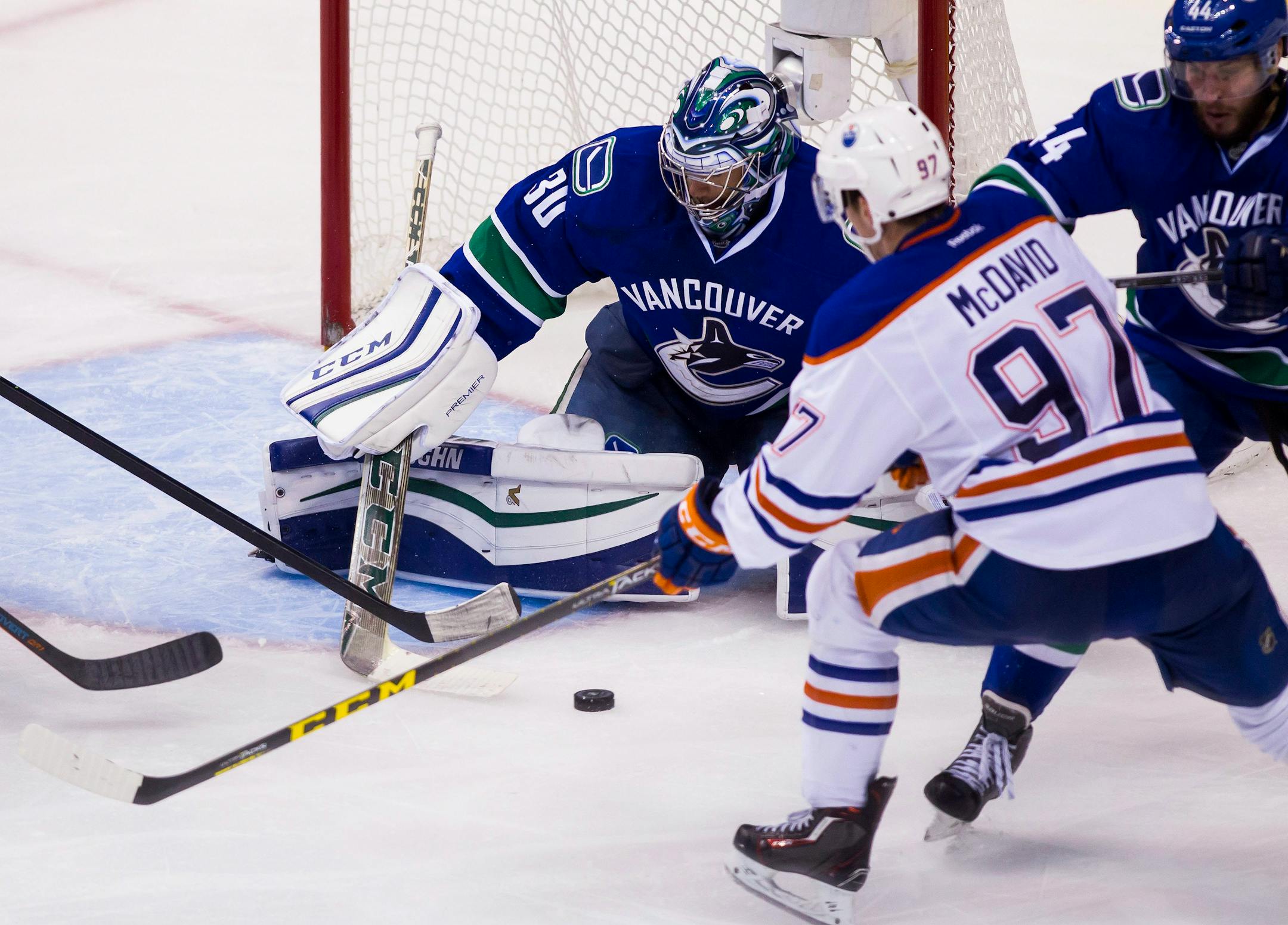 Canucks goaltender Ryan Miller made a save against the Oilers' Connor McDavid (97) in a Oct. 18 game.