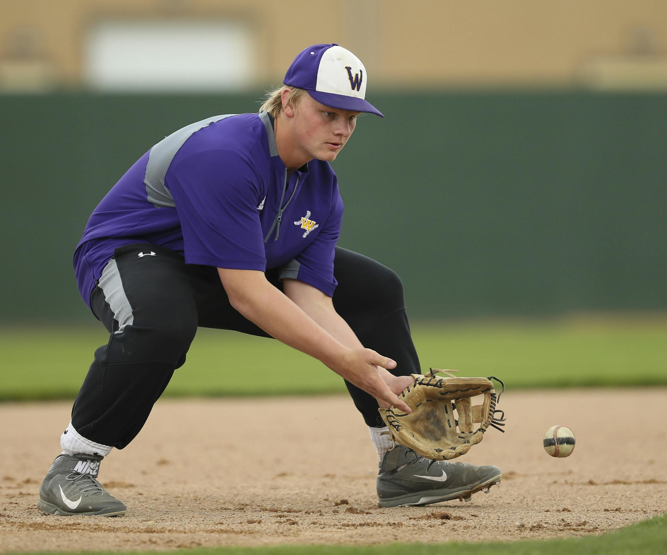 Waconia third baseman Jake Hendricks during infield drills at practice Tuesday afternoon. ] JEFF WHEELER ï jeff.wheeler@startribune.com Feature on the Waconia High School baseball team as they worked out after school Tuesday, May 23, 2017 in Waconia.
