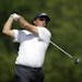Phil Mickelson tees off on the second hole during the third round of the U.S. Open golf tournament at Merion Golf Club, Saturday, June 15, 2013, in Ar