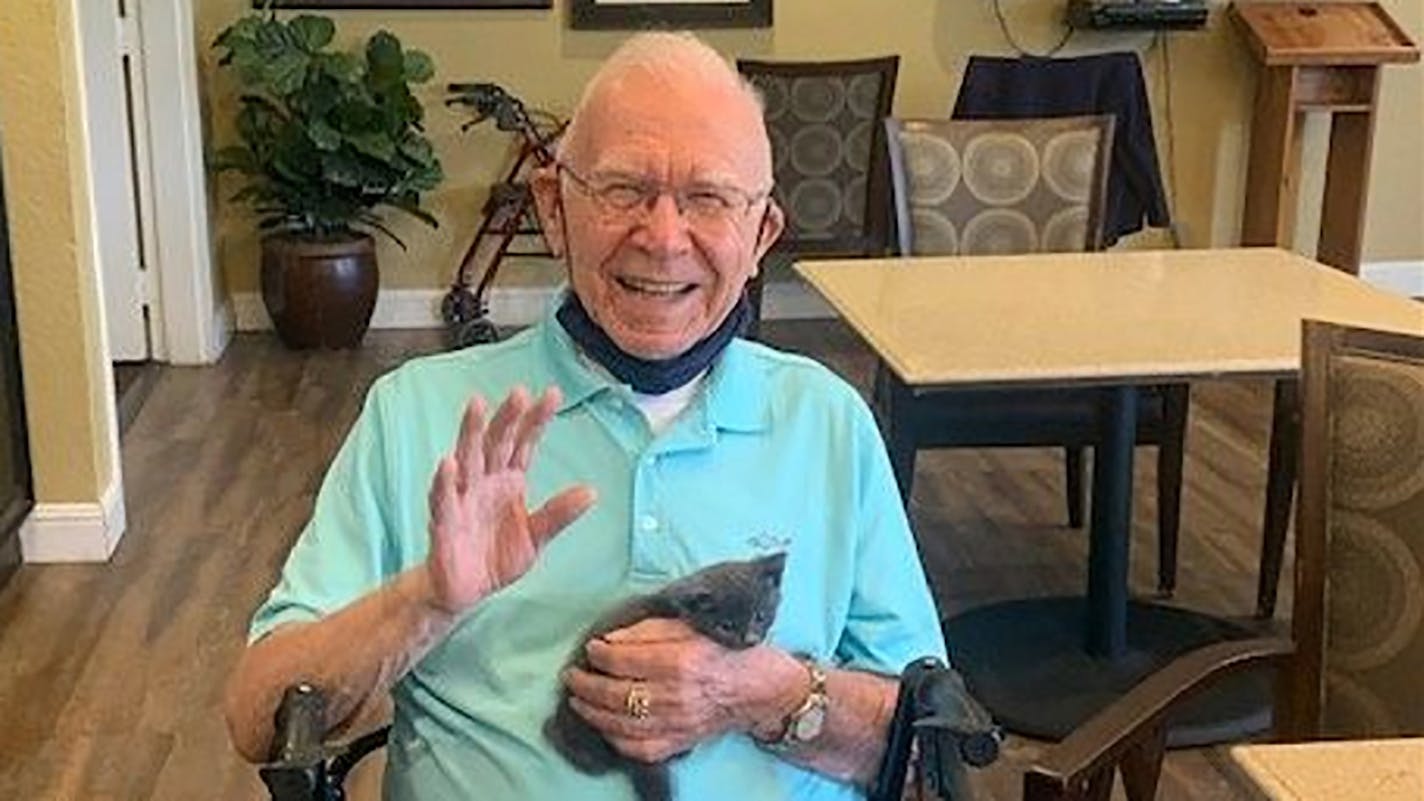 Donald Friske at a "Kitten Therapy Day" this year at the Meridian at Anaheim Hills assisted-living center in California. MUST CREDIT: Lori Irby.