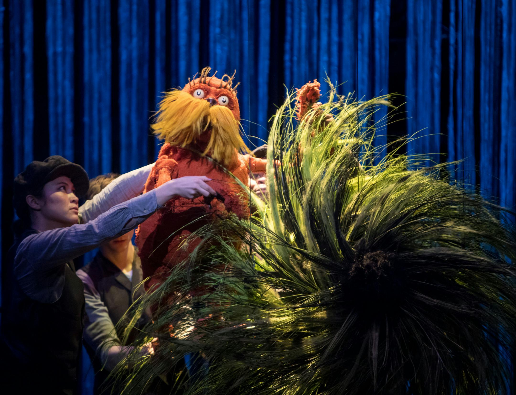 Meghan Kreidler and Rick Miller and H Adam Harris puppeting The Lorax in Dr. Seuss's The Lorax by Children's Theatre Company
Photo by Dan Norman