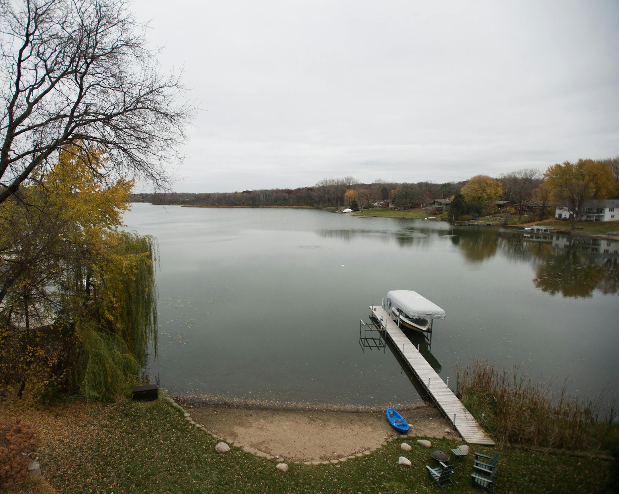 The view of Sweeney Lake from Jane McDonald Black's backyard Wednesday afternoon. ] AARON LAVINSKY • aaron.lavinsky@startribune.com Golden Valley residents are working to save Sweeney Lake from degradation caused by nearby development. The lake was crystal clear before the construction of the I-394 and widening of Olson Memorial Highway caused salt and sediment to flow into the lake. Sweeney Lake was photographed from the backyard of Jane McDonald Black (cq) Wednesday, October 29, 2014 in