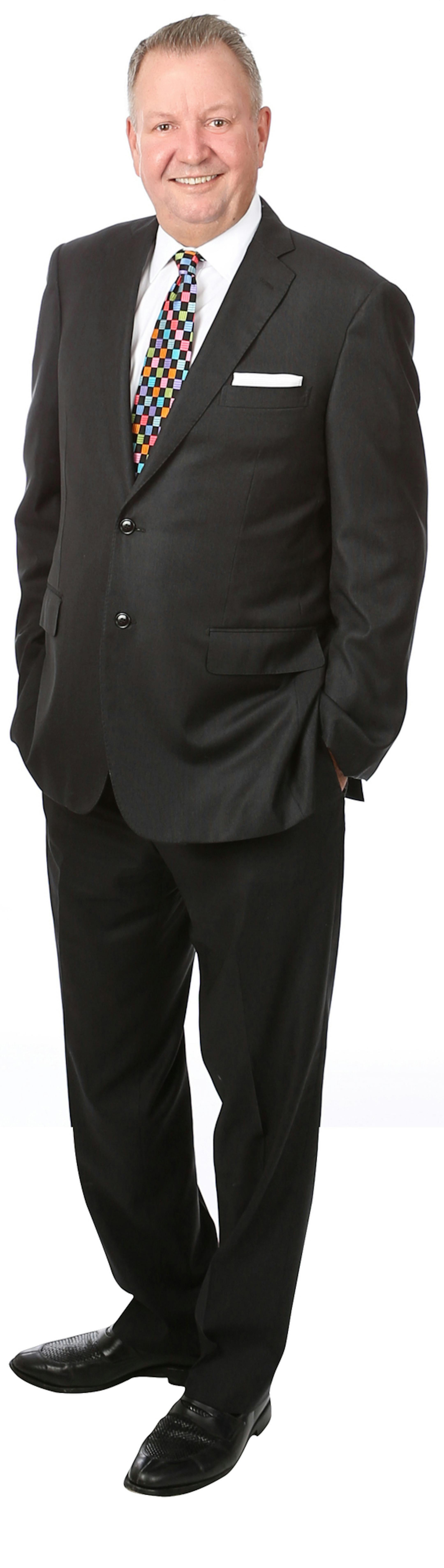 John Smaby, a longtime sales manager for Edina Realty, was recently elected to the top position with the National Association of Realtors after a three-year campaign. He's only the second in the state to hold this position, his father was the first. credit: Sarah Pierce Photography