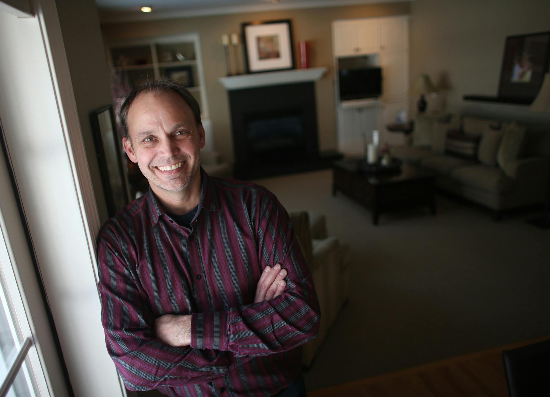 Chris Prescott, market manager for Redfin stood inside the first house in the Minnesota that Redin will be closing on after opening here in Decmber in Chaska Tuesday, February 25, 2014 ] (KYNDELL HARKNESS/STAR TRIBUNE) kyndell.harkness@startribune.com