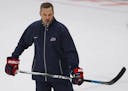 United States coach Robb Stauber skates during practice in preparation for the IIHF Women's World Championship hockey tournament, Thursday, March 30, 