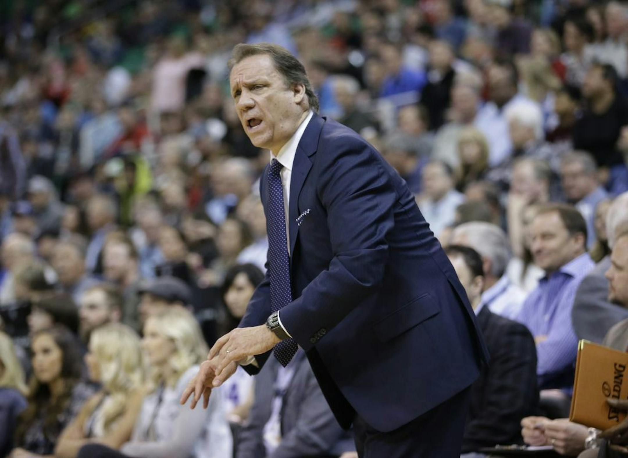 Minnesota Timberwolves head coach Flip Saunders shouts to his team in the first quarter in an NBA basketball game against the Utah Jazz, Monday, March 23, 2015, in Salt Lake City.