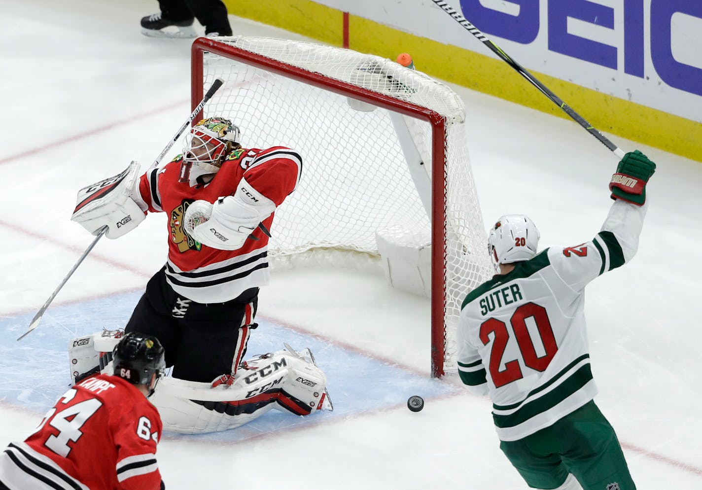 Minnesota Wild's Ryan Suter (20) celebrates his goal past Chicago Blackhawks goaltender Anton Forsberg during the third period of an NHL hockey game Wednesday, Jan. 10, 2018, in Chicago. The Wild won 2-1. (AP Photo/Charles Rex Arbogast)