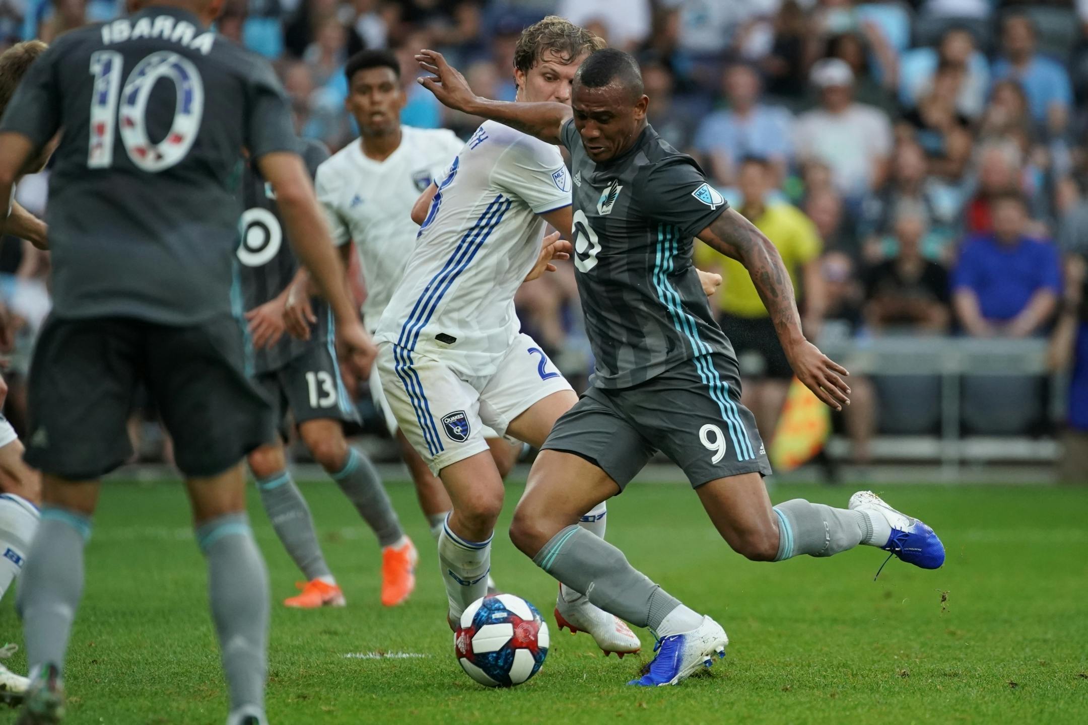 Minnesota United forward Angelo Rodriguez (9) attempted to slip a shot past San Jose Earthquakes midfielder Florian Jungwirth (23) in the first half.