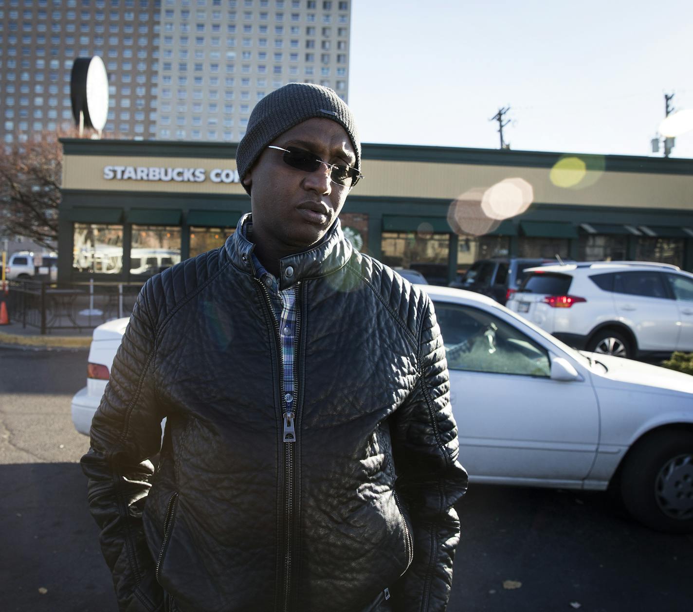 Ali Jama stands outside the Starbucks in Cedar-Riverside. He says that he will move his family out of the country soon because of Donald Trump's election. "I'm afraid. My children are afraid," said Jama. ] (Leila Navidi/Star Tribune) leila.navidi@startribune.com BACKGROUND INFORMATION: Reaction from the local Somali community to the election of Donald Trump as president at the Starbucks in the Cedar-Riverside neighborhood of Minneapolis on Wednesday, November 10, 2016.