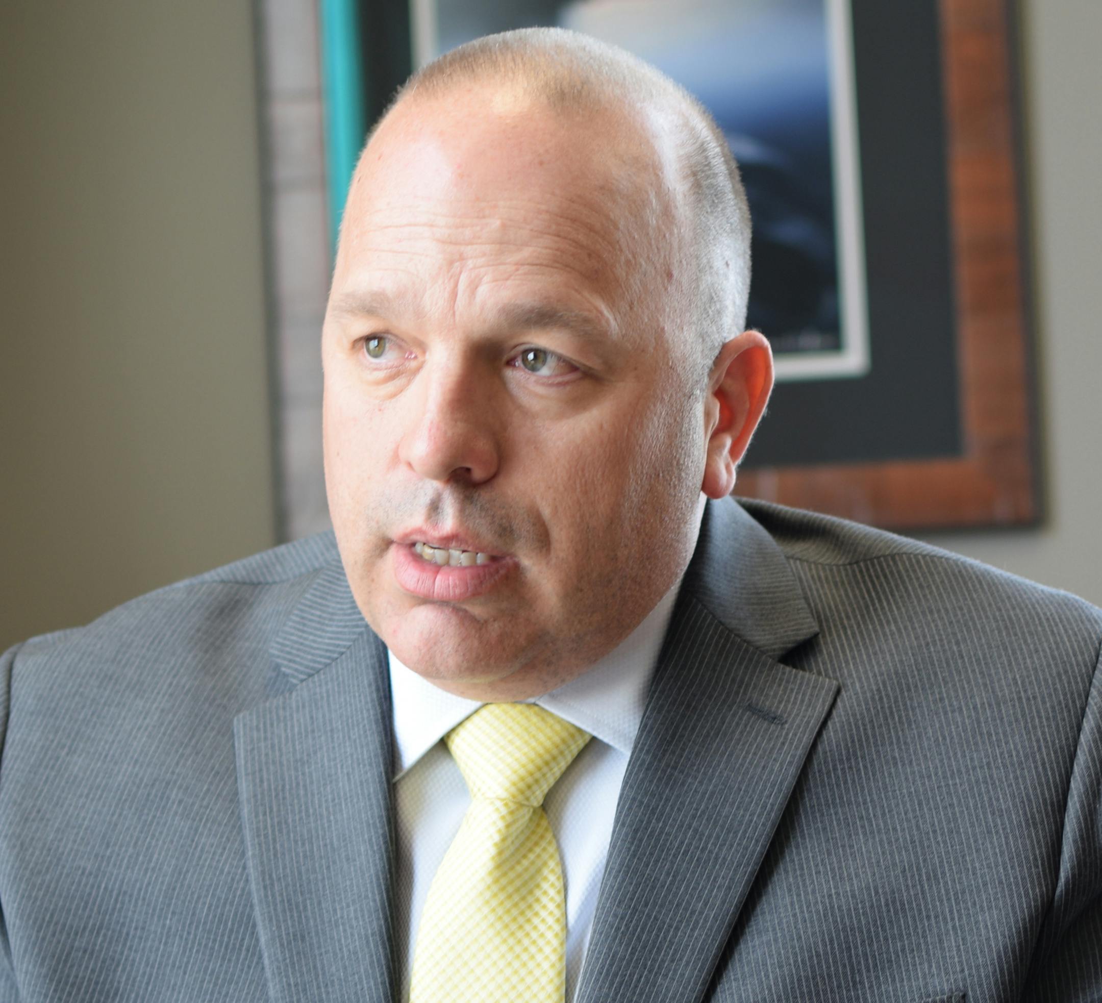 St. Paul Police Chief Todd Axtell says the department's use of K-9s for human apprehension won't stop, because the dogs save lives.