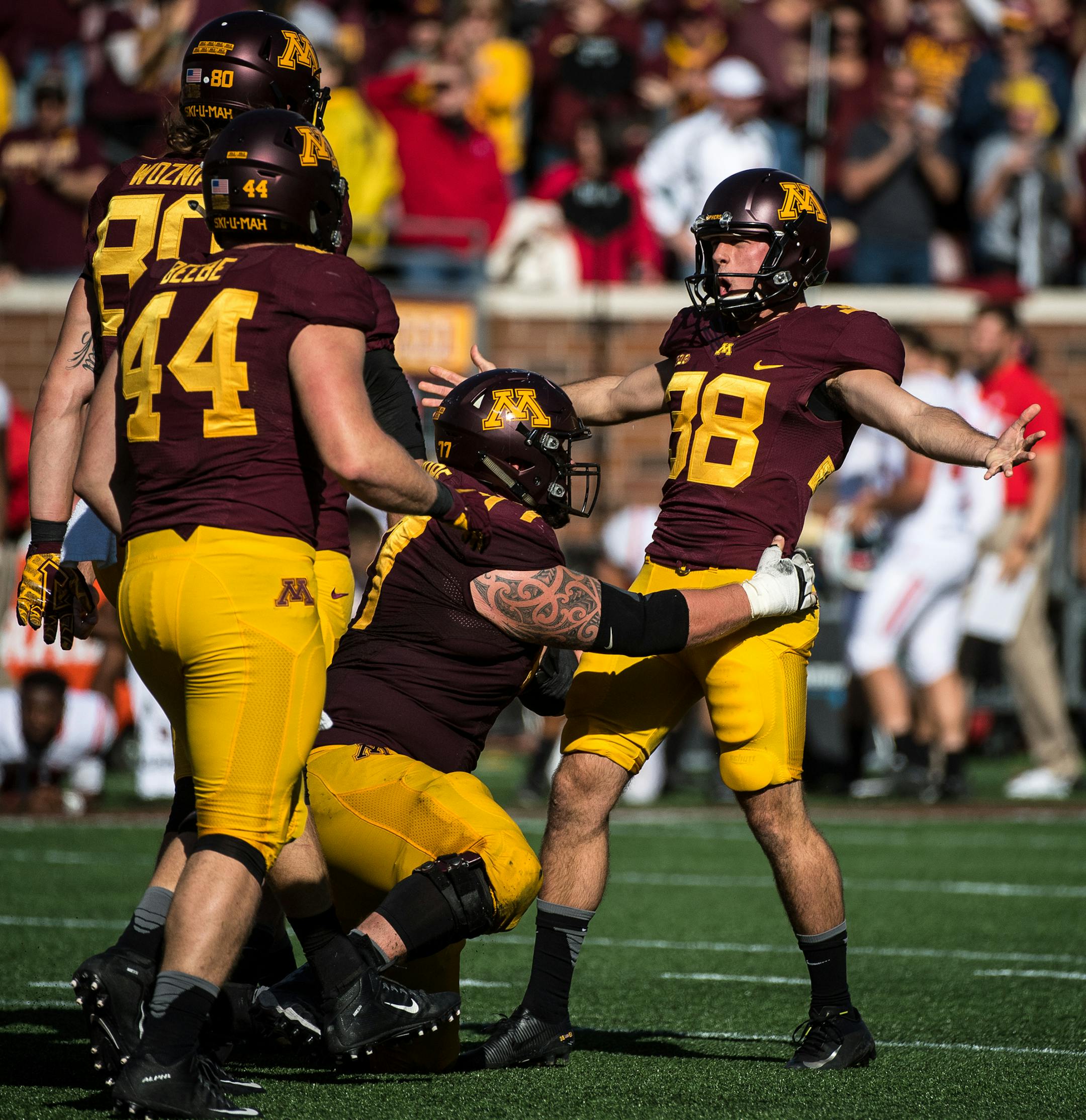 Players celebrate with Minnesota Golden Gophers place kicker Emmit Carpenter (38) after his game-winning field goal in the final seconds of play Saturday against Rutgers. ] (AARON LAVINSKY/STAR TRIBUNE) aaron.lavinsky@startribune.com The University of Minnesota Golden Gophers football team played the Rutgers Scarlet Knights on Saturday, Oct. 21, 2016 at TCF Bank Stadium in Minneapolis, Minn.