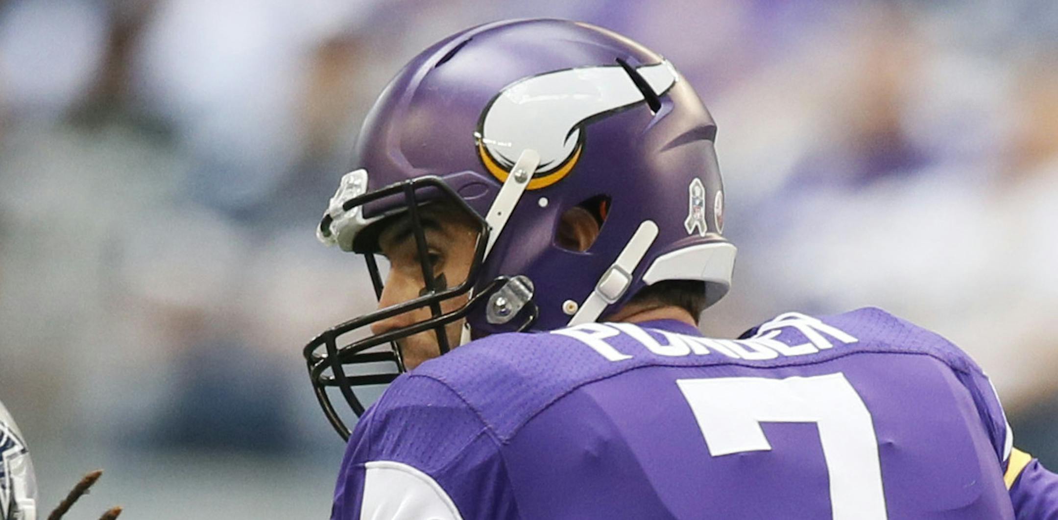 Vikings quarterback Christian Ponder breaks away from Cowboy's B.W. Webb in the 1st quarter. ] Minnesota Vikings vs Dallas Cowboys, AT&T Stadium. Dallas, TX - 11/03//2013