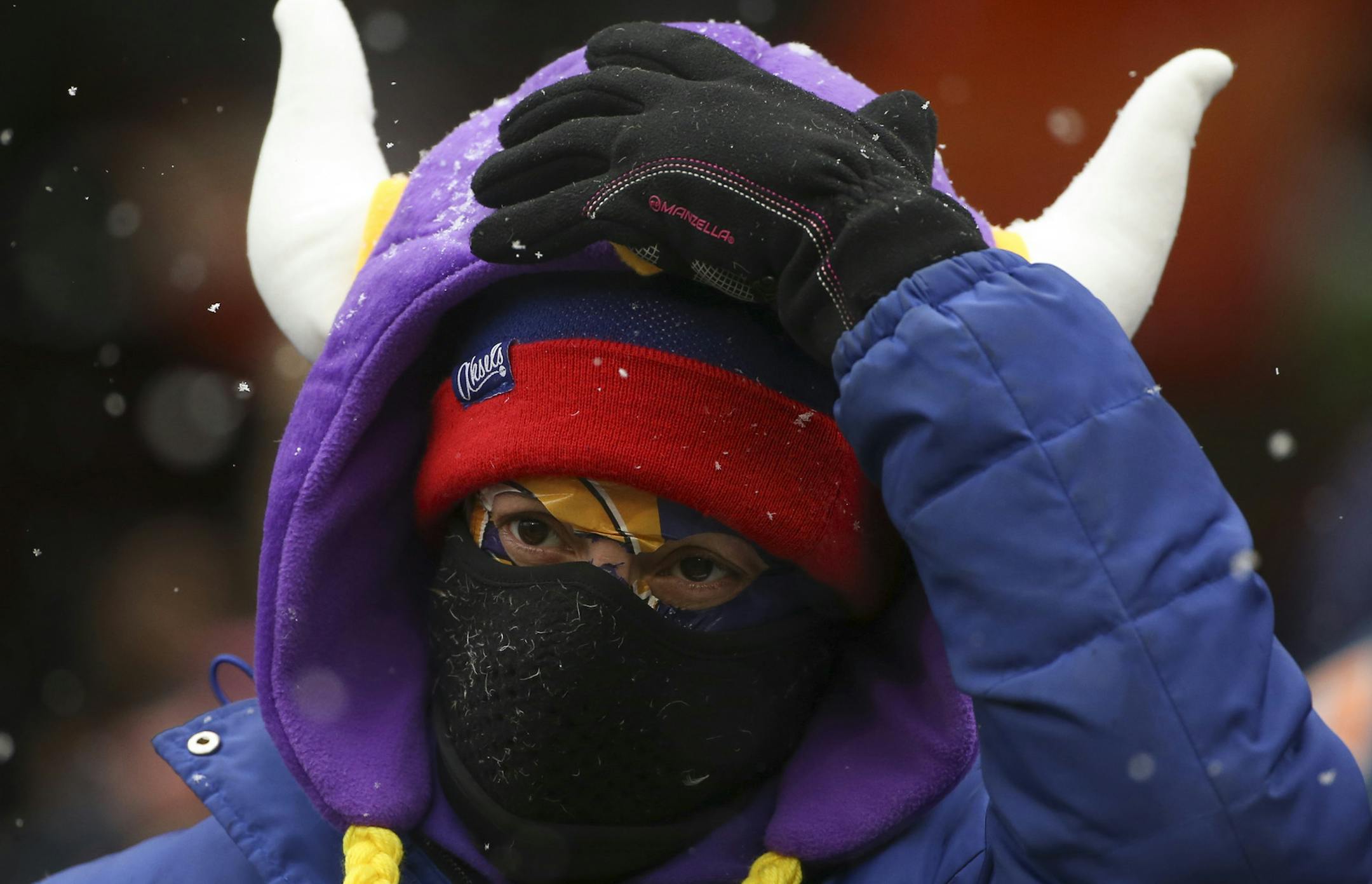 Megan Mitchell, a Vikings fan from Denver, adjusted her hat Sunday afternoon at Soldier Field in Chicago. ] JEFF WHEELER ‚Ä¢ jeff.wheeler@startribune.com The Vikings lost to the Chicago Bears 21-13 Sunday afternoon, November 16, 2014 at Soldier Field in Chicago.