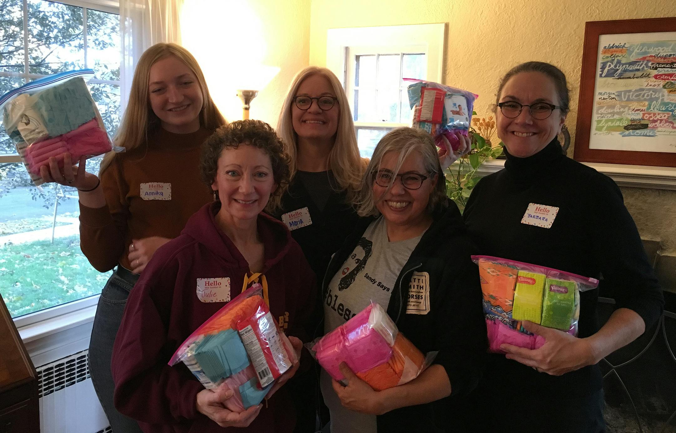 Deb Balzer of Northfield, front right, started a drive to supply sanitary products to homeless women. "It's someone else's job to change their lives and get them off the street, but we can do this one real thing to help them get through the night," she said.