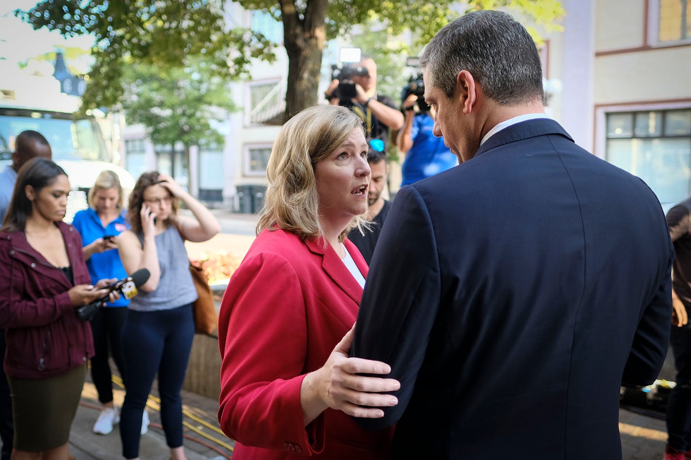 Nan Whaley, mayor of Dayton, Ohio, spoke with U.S. Rep. Tim Ryan, D-Ohio, on Monday morning near the scene of a mass shooting that occurred over the weekend in the city's Oregon District.