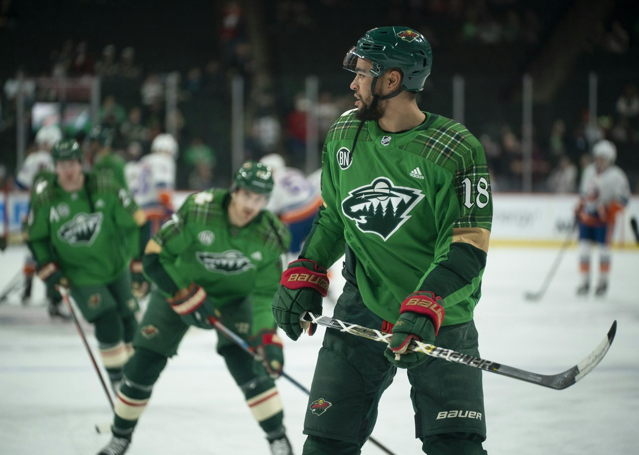 The Wild skated in Irish themed sweaters during the warm ups for Sunday afternoon's St. Patrick's Day game against the New York Islanders.