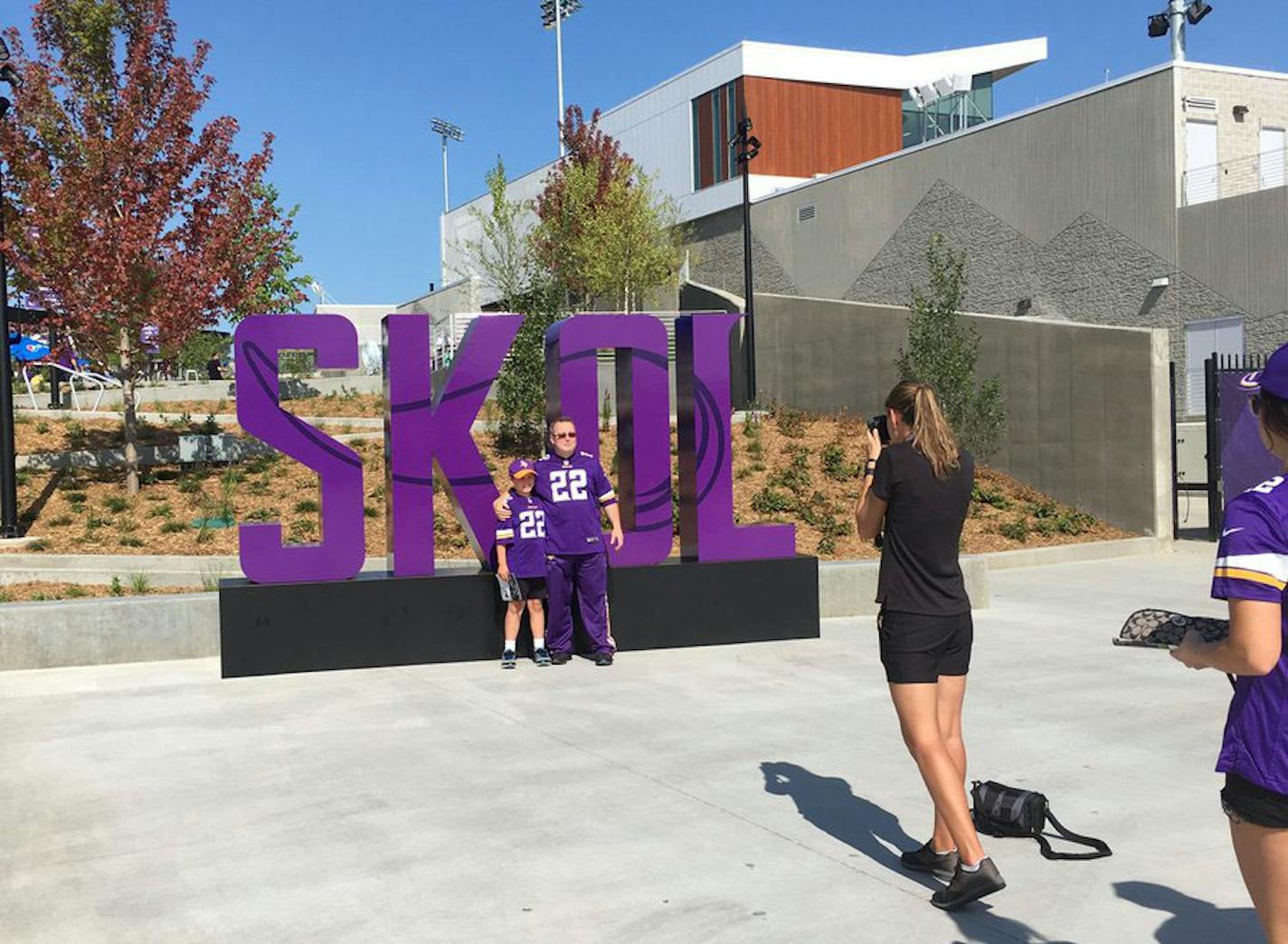 A snapshot in front of a "Skol" sign at the Twin Cities Orthopedics Performance Center on Saturday morning in Eagan.