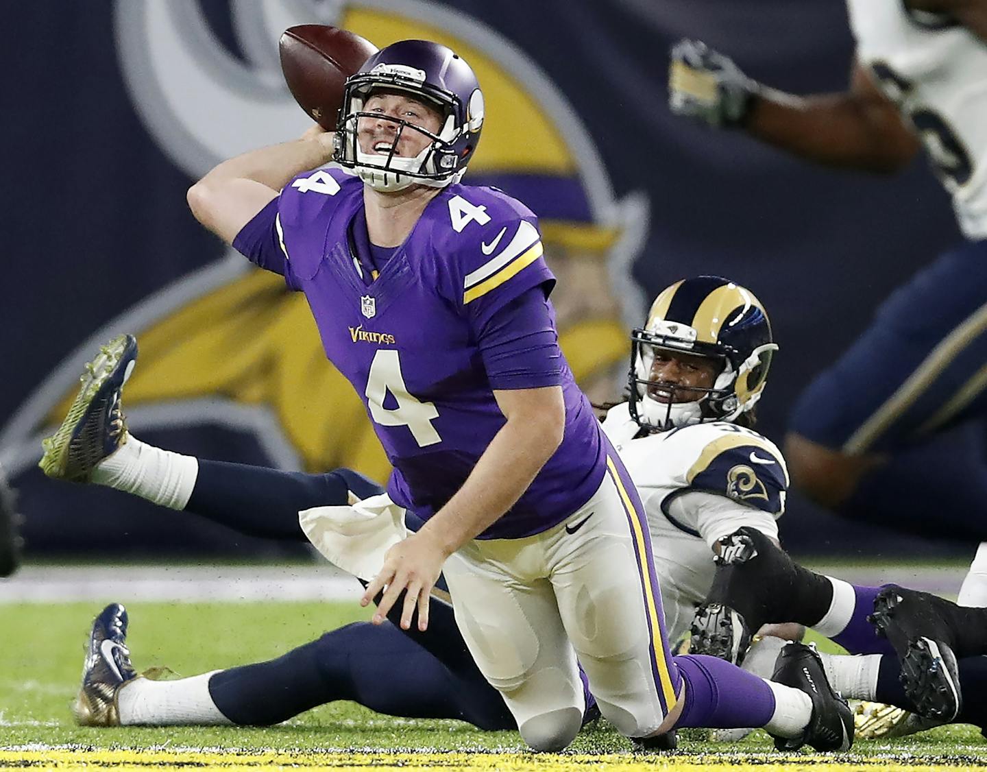 Vikings quarterback Brad Sorensen (4) was sacked in the fourth quarter.