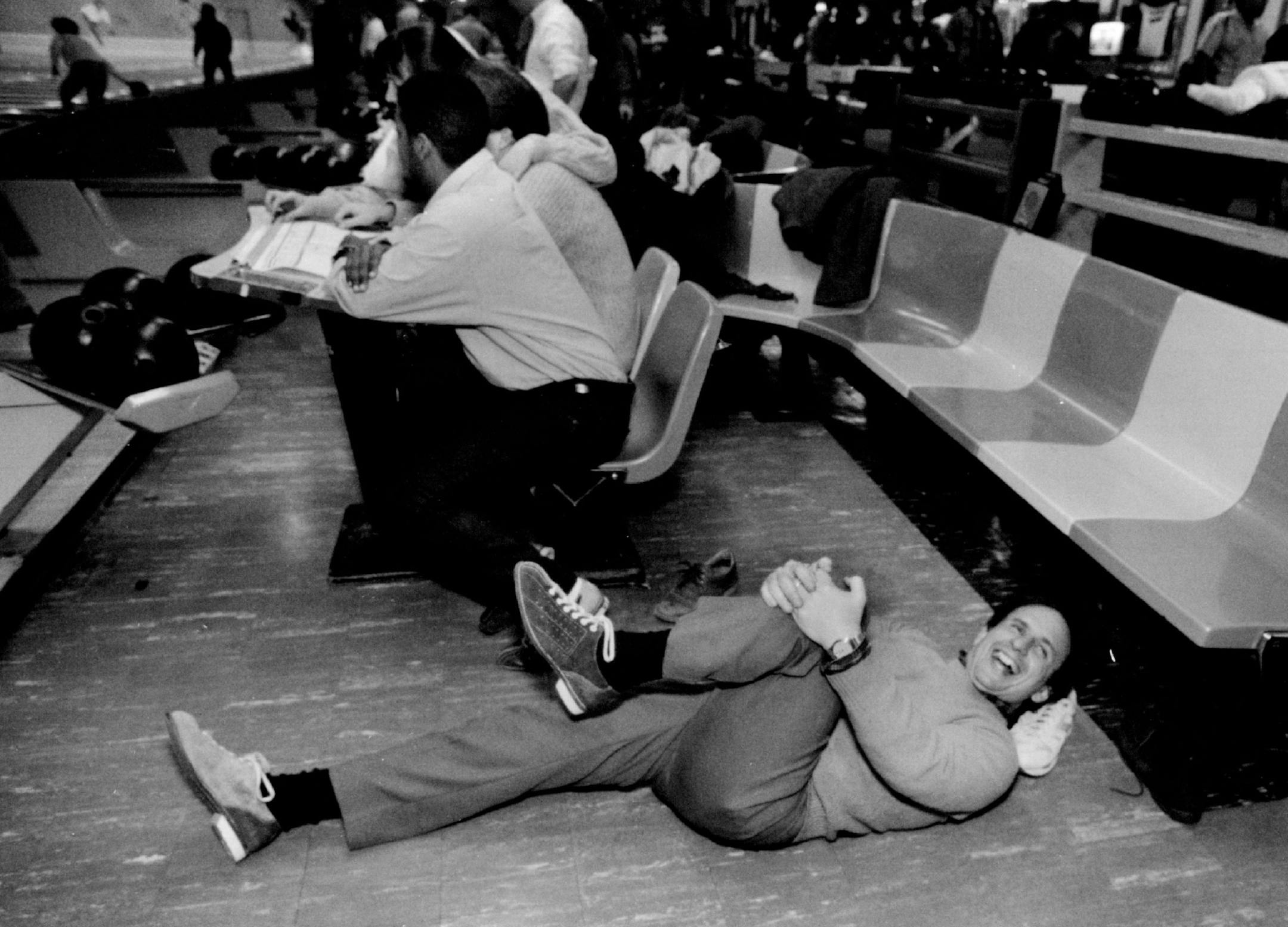 December 25, 1990: Paul Wellstone goes throurgh a warm-up routine while getting ready to bowl at the Diversey Bowl in Chicago, II.