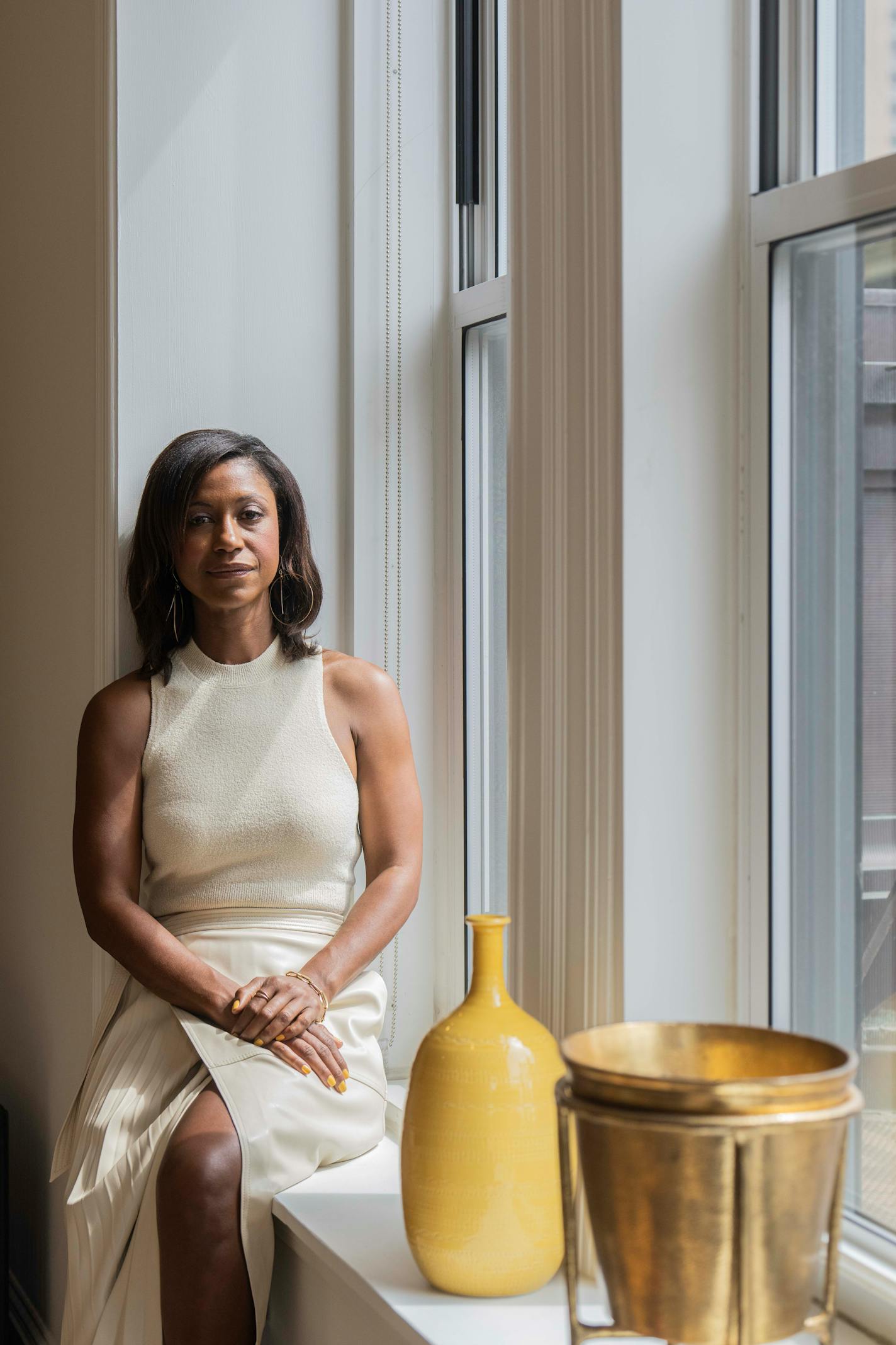 Elizabeth Graziolo, founder and principal of Yellow House Architects, at her office in Manhattan on Aug. 17, 2023. In the three years since she started Yellow House, Graziolo has developed a busy practice devoted to high-end residential design in a style she calls 'clean classicism' ' buildings that take traditional forms but eschew excessive ornamentation. (Hiroko Masuike/The New York Times)