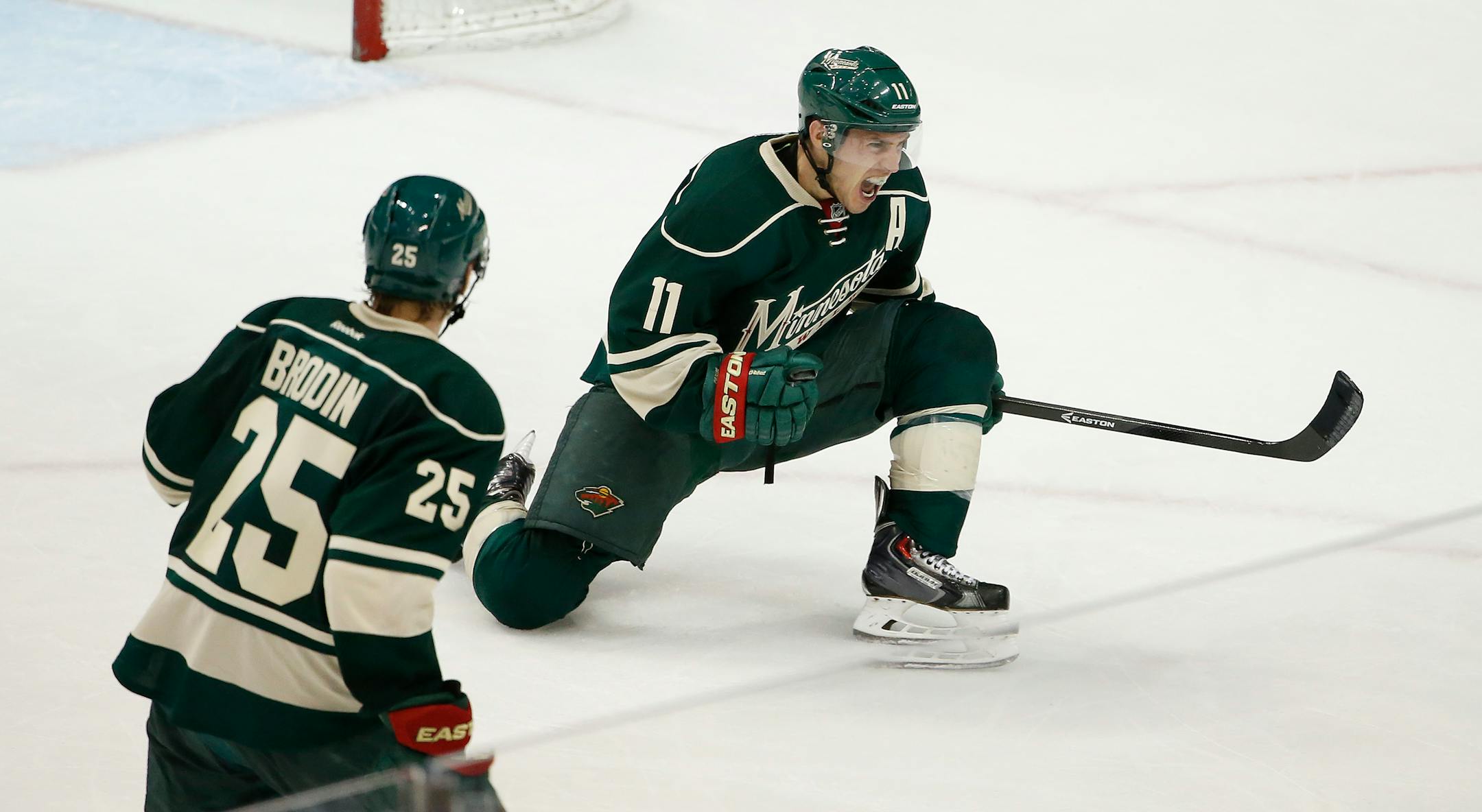 The Wild's Zach Parise (11) celebrated his second goal of the night with teammate Jonas Brodin, giving the Wild a 3-2 lead in the third period.