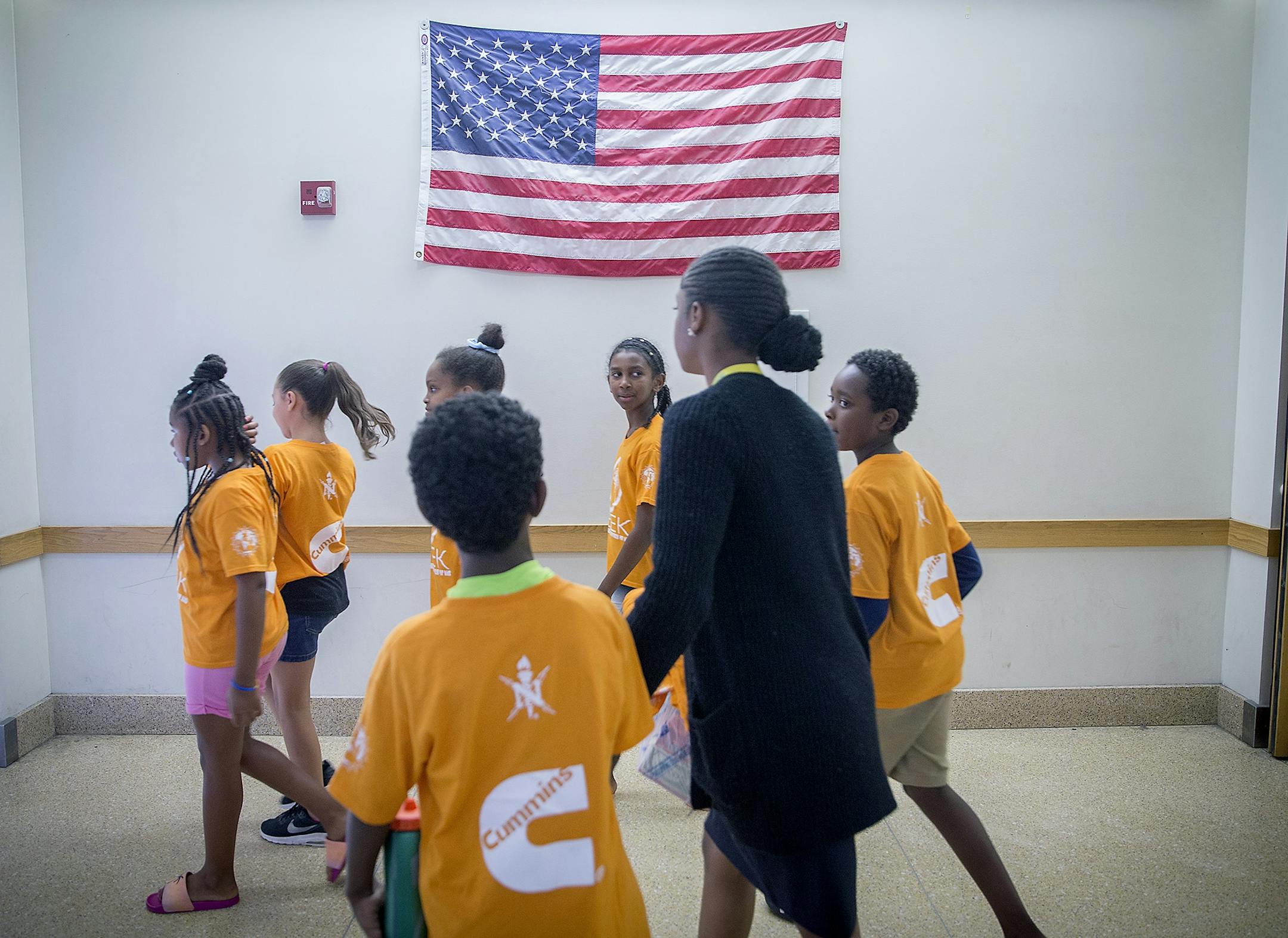 Students made their way between different competitions during the STEM camp at Earle Brown Elementary school, Friday, July 20, 2018 in Brooklyn Center, MN. The summer program is aimed at introducing black students to STEM (science, technology, engineering and math) coursework. The National Society of Black Engineers, which sponsors the program, has a goal of graduating 10,000 black engineers annually by 2025. The summer program, which runs through July 27, now is in its 12th year, and is being o