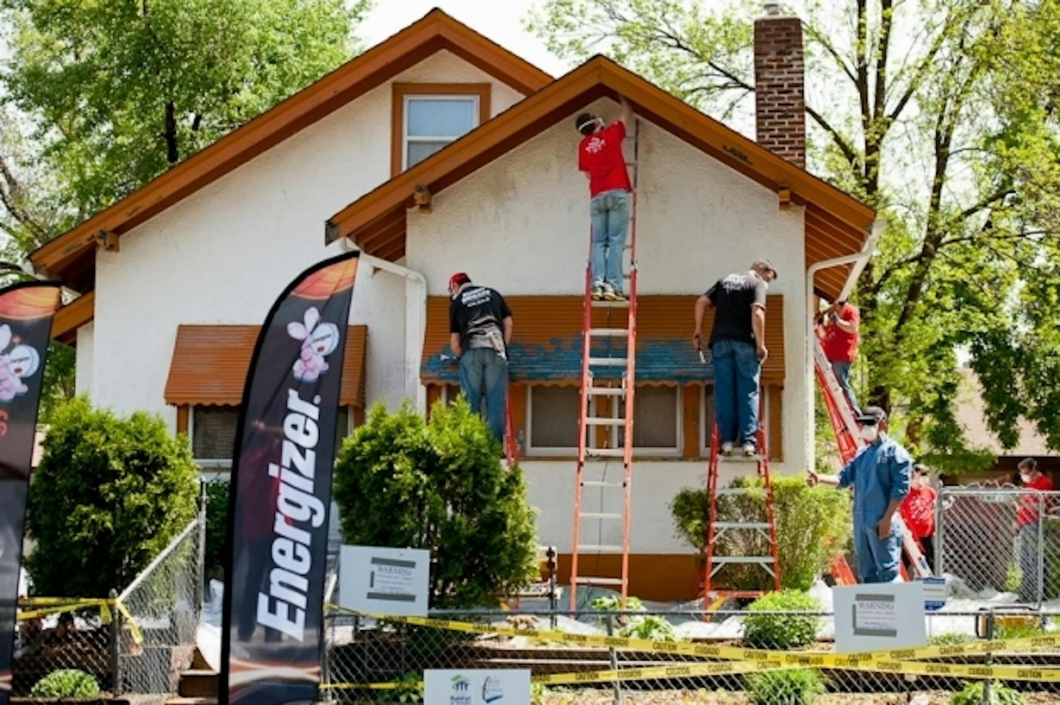 Volunteers work on the North Minneapolis home.