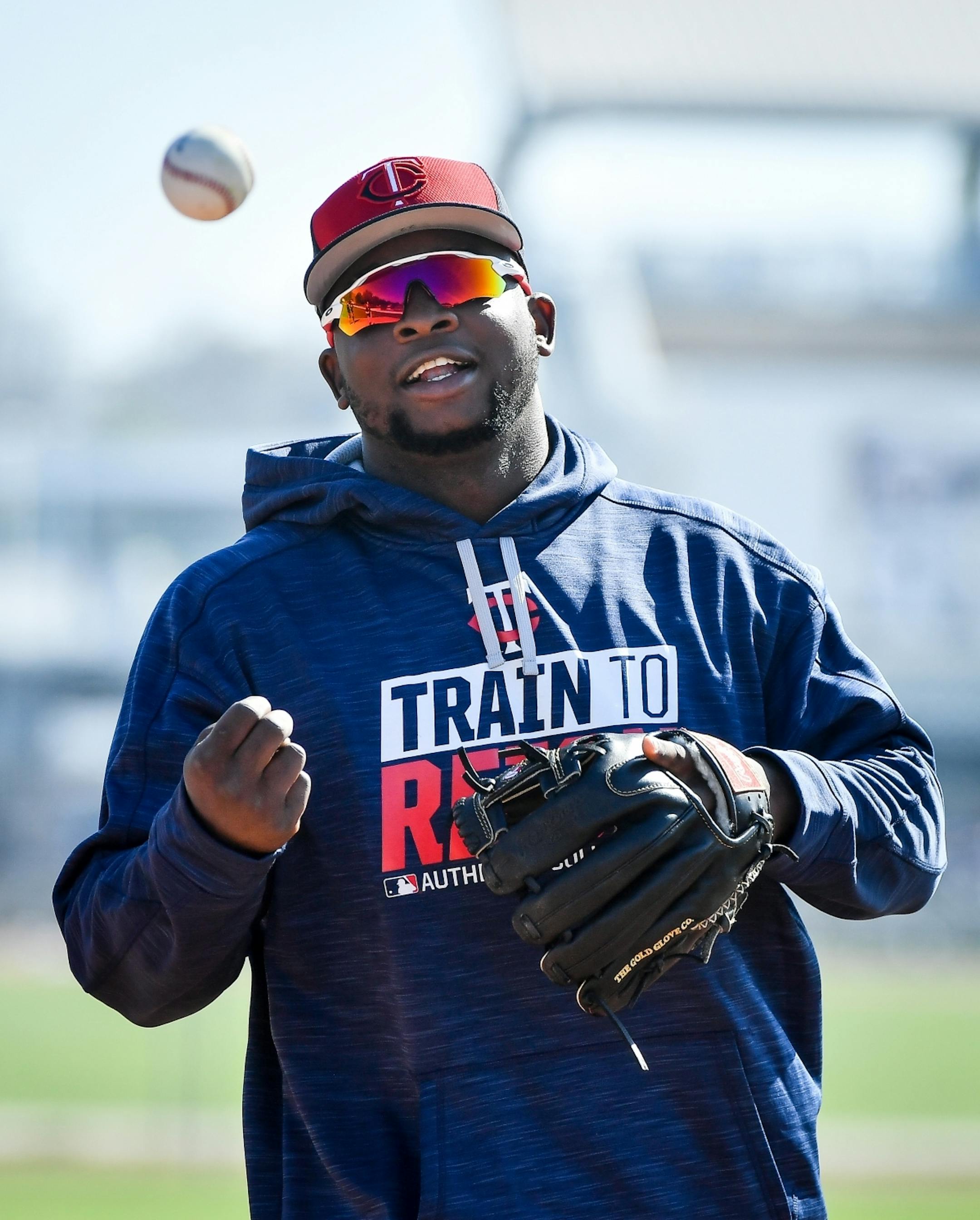 Minnesota Twins third baseman Miguel Sano (22) tossed a ball to the side during fielding drills Friday.
