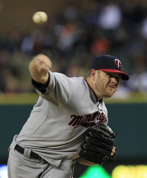 Twins pitcher P.J. Walters throws during the first inning against the Tigers last September.