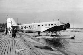 The Junkers Ju 52 aircraft "Kaleva" by the Finnish airline Aero is parked at the Katajanokka seaplane harbor in Helsinki equipped with floating bottom