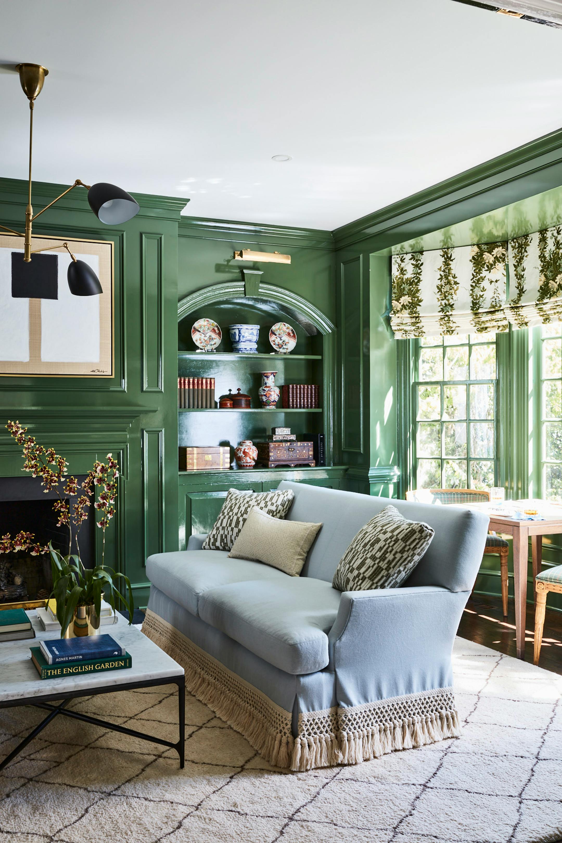 Green has long been a popular color for libraries, Leah O'Connell says. She chose a brighter shade with a glossy finish for a more energized feel befitting a young family. MUST CREDIT: Anna Williams