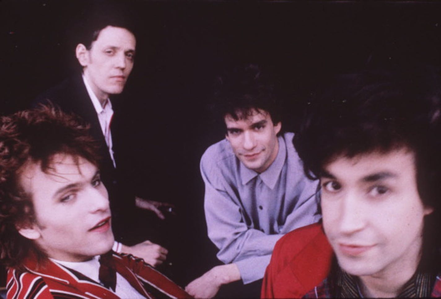 Bob "Slim" Dunlap (back left) Chris Mars (front right) and some other guys who used to be in the Replacements, circa 1989. / Sire Recorrds publicity photo