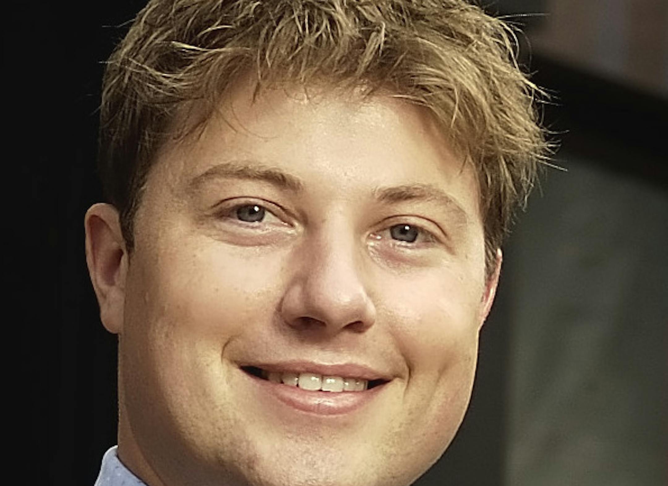 David Brewster/StarTribune Tuesday_07/26/05_Mpls - - - - - - Benjamin Graves (President) and his father Jim Graves (owner/CEO) in front of their newly renamed hotel , Graves 601 (it used to be Le Meridien). Doorman is on the left and the scaffolding to be used to hoist a larger sign with the new hotel name tomorrow.
