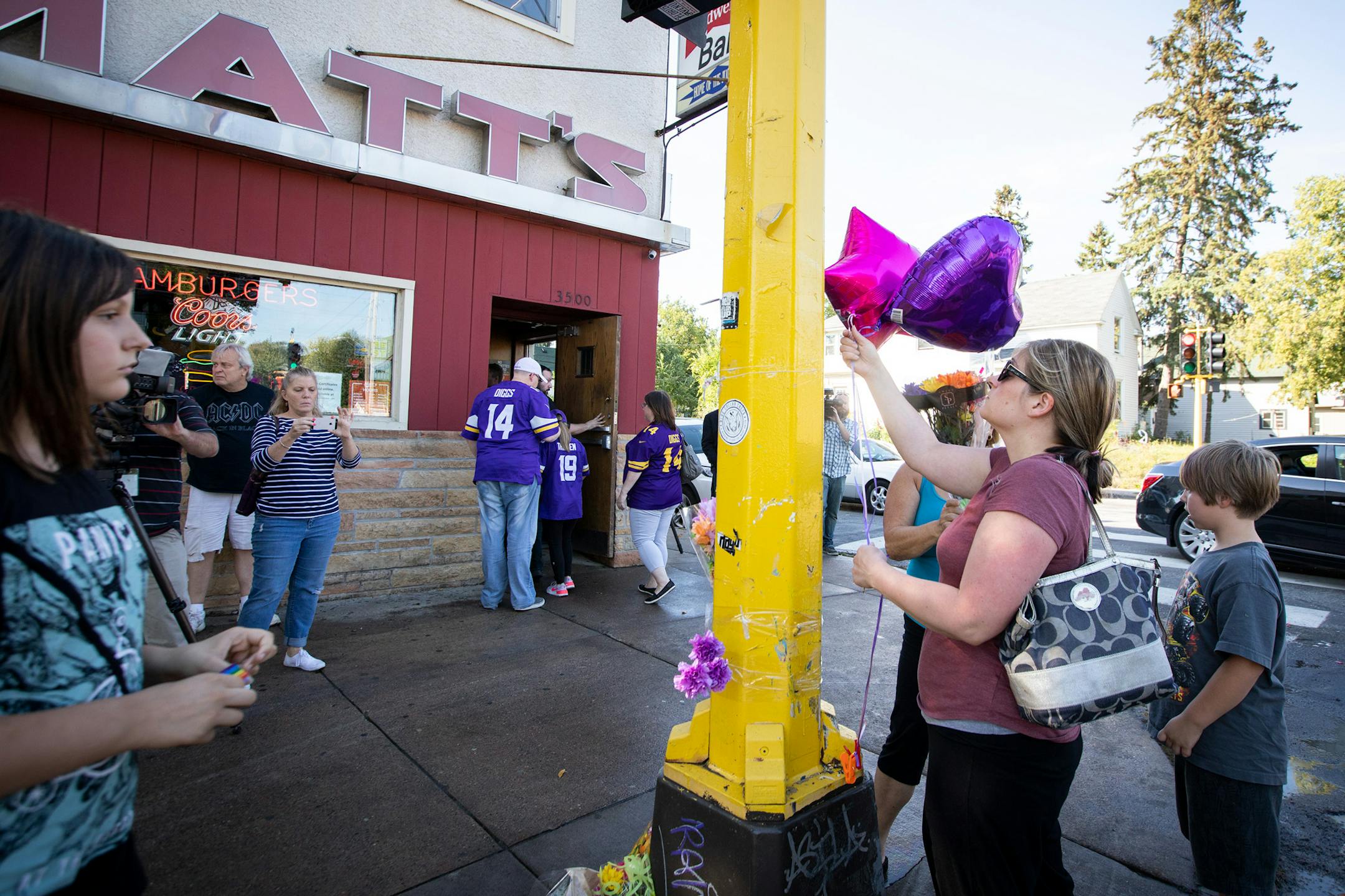 Those who identified only as extended members of the family of Sheryl and Kenneth Carpentier, two of the victims, put up balloons and flowers on the growing memorial outside of Matt's Bar. ] LEILA NAVIDI ï leila.navidi@startribune.com BACKGROUND INFORMATION: A memorial for the victims is seen outside of Matt's Bar in Minneapolis on Sunday, September 23, 2018. A teenager speeding from state troopers in a stolen SUV hit another vehicle and killed three people early Sunday at a south Minneapolis in