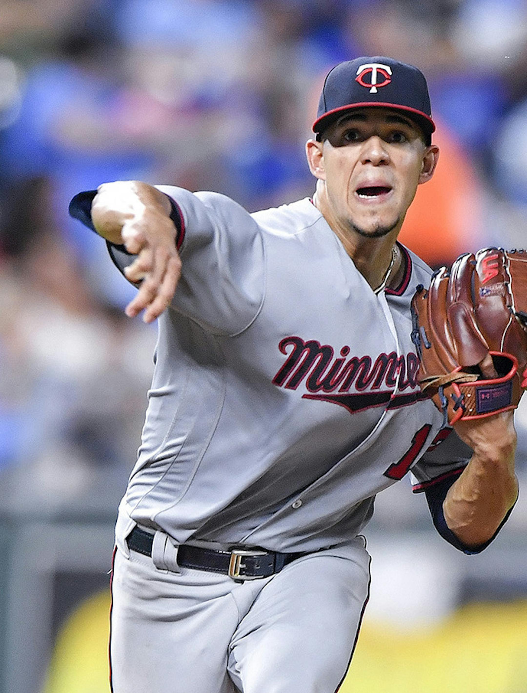 Minnesota Twins starting pitcher Jose Berrios throws to first to chase back the Kansas City Royals' Alex Gordon in the third inning on Friday, Sept. 14, 2018, at Kauffman Stadium in Kansas City, Mo. (John Sleezer/Kansas City Star/TNS) ORG XMIT: 1267528
