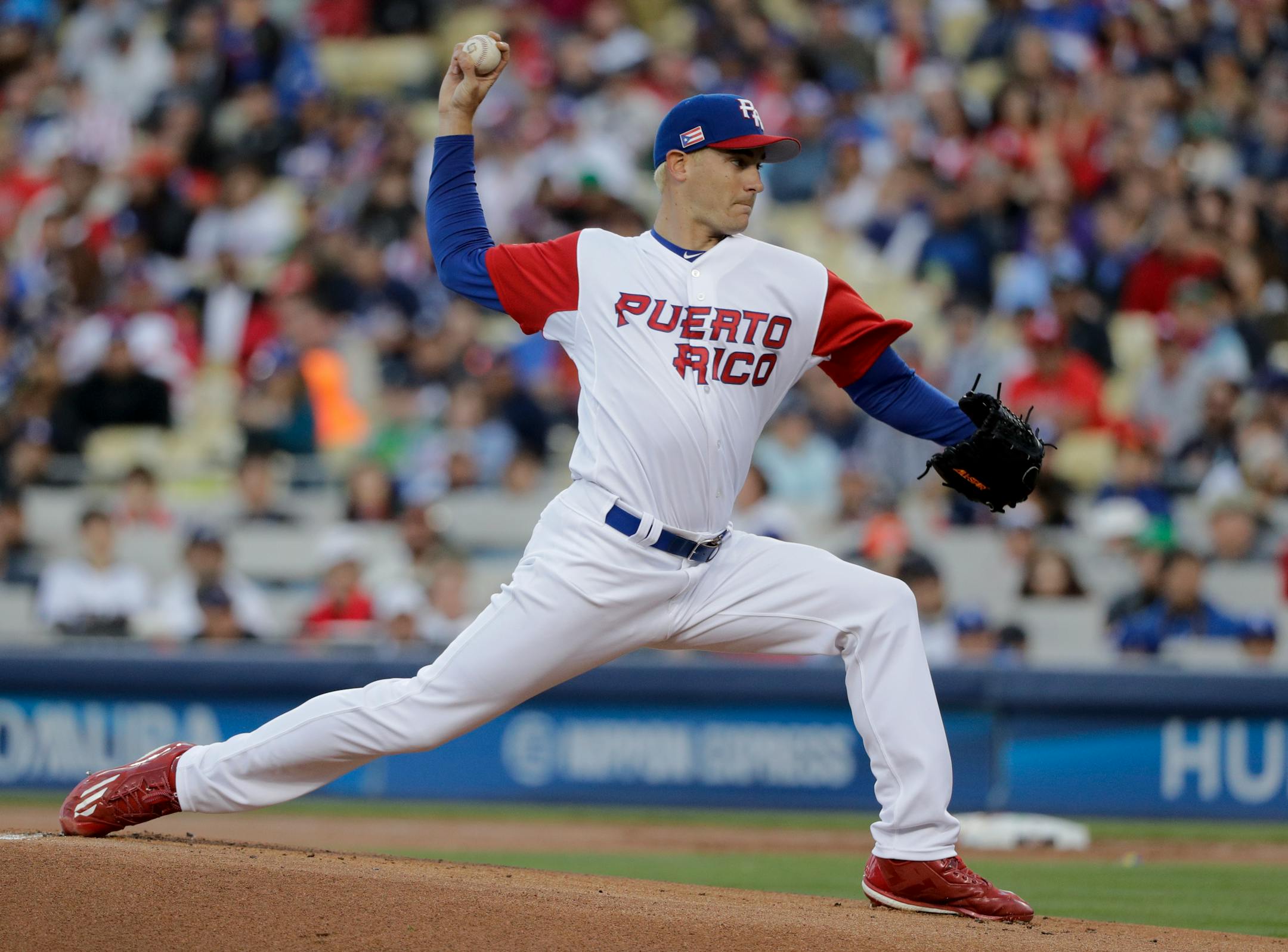 Puerto Rico pitcher Seth Lugo throws against the United States during the first inning of the final in the World Baseball Classic in Los Angeles, Wednesday, March 22, 2017. (AP Photo/Jae C. Hong)