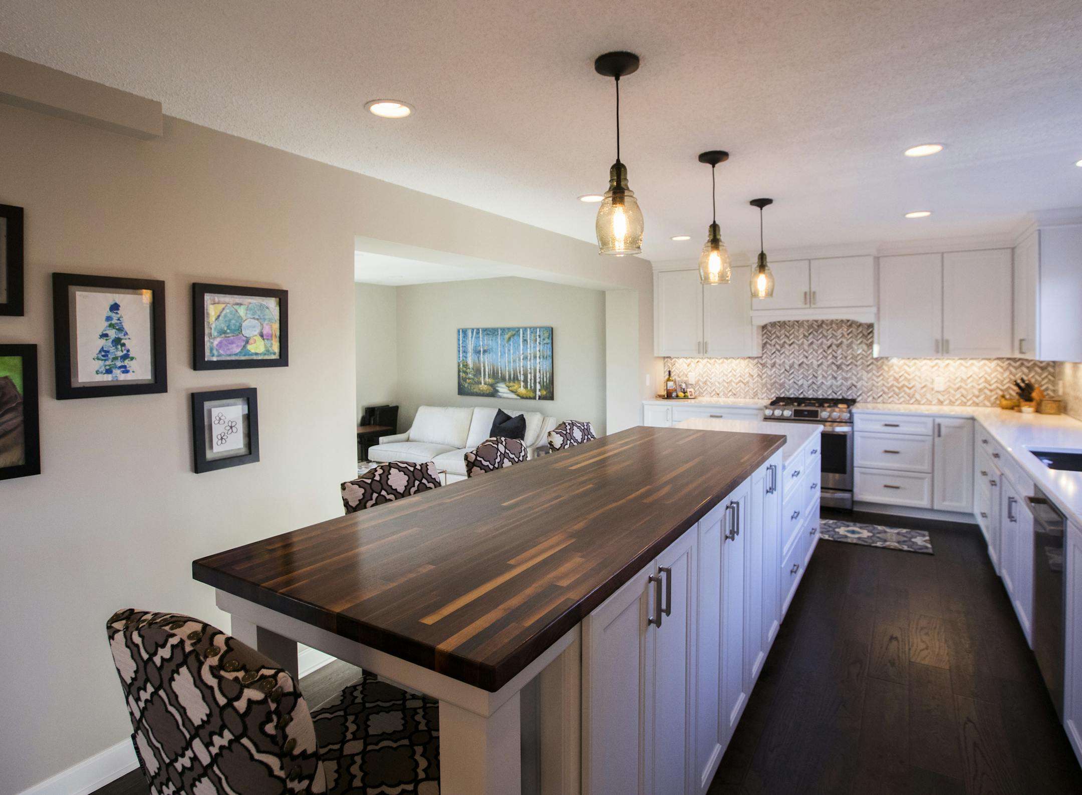 The Fricks took down a wall and incorporated the space from their former dining room into their new kitchen, which now has room for a 12-foot center island.
