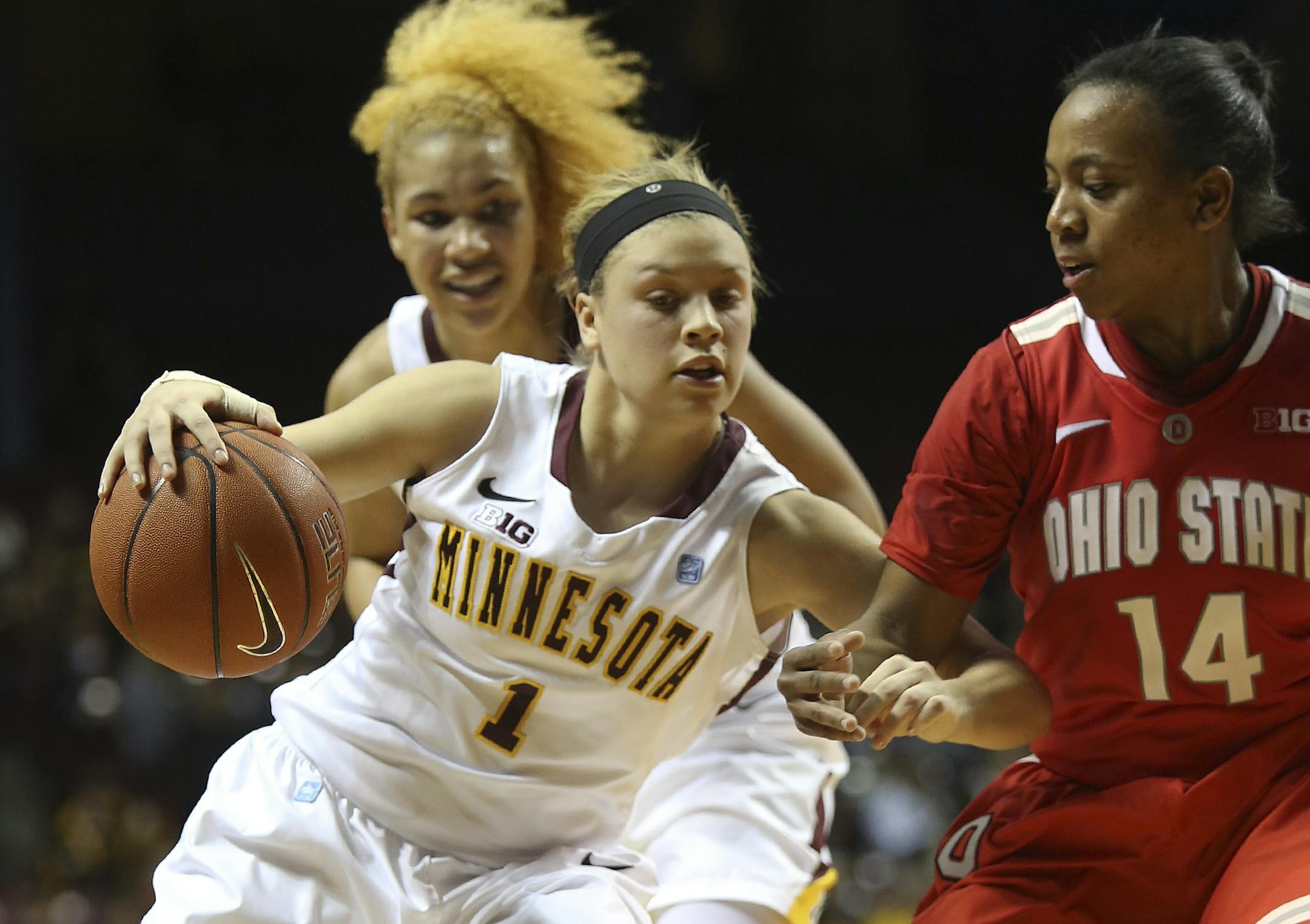 Rachel Banham tried to make space along the sideline to shoot with Ohio State's Ameryst Alston defending