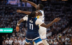 Golden State Warriors forward Draymond Green elbows Minnesota Timberwolves center Naz Reid (11) in the head in the second quarter of Game 2 of their N